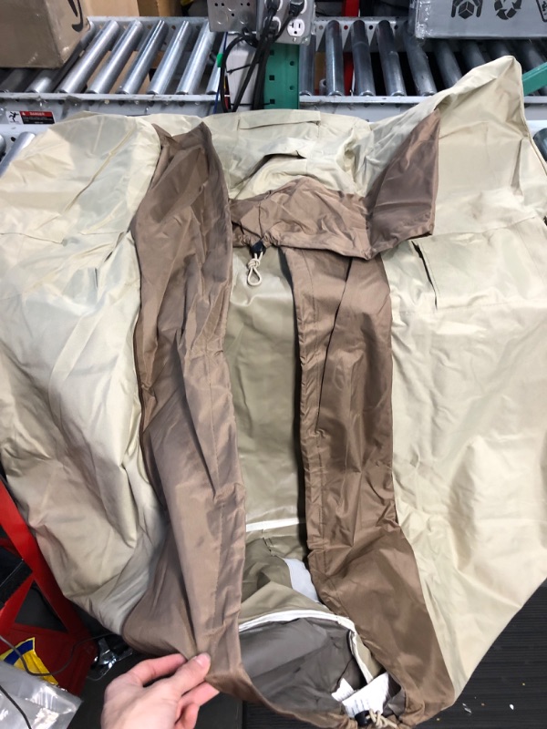 Photo 1 of ***SIMIALR TO STOCK PHOTO*** Waterproof Patio Furniture Table Covers Durable, Rectangular Outdoor Coffee Table Covers - Fits up to 74L x 47W x 28H inches 74"L x 47"W x 28"H Brown