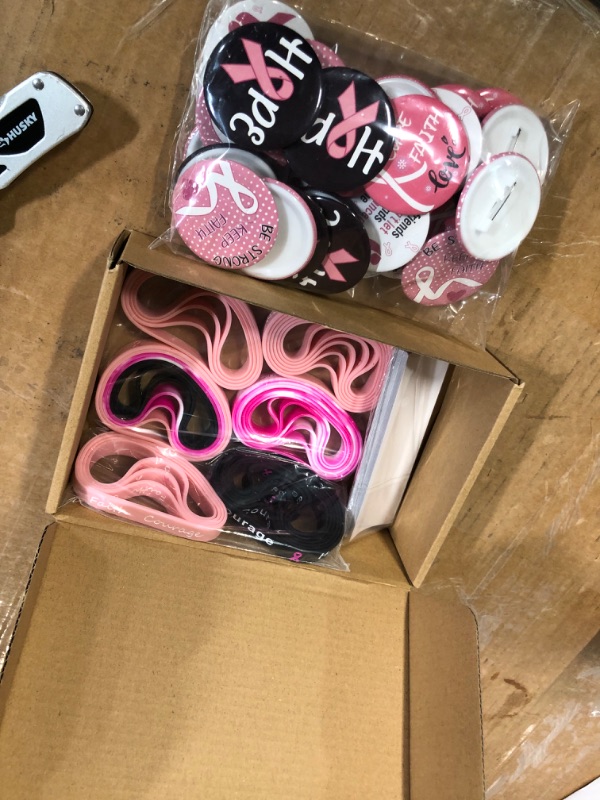 Photo 4 of **non refundable****
Kigeli 128Pcs Breast Cancer Awareness Gift Include 32 Pink Ribbon Round Pin Buttons in 4 Designs 32 Pink Ribbon Camouflage Bracelets 64 Die Cut Pink Ribbon Stickers Breast Cancer Decorations for Party