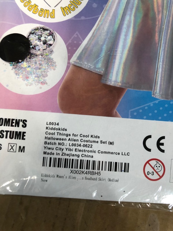Photo 1 of Kiddokids Halloween Alien Costume; Women's Metallic Holographic Skirt with Headband and Silver Glitter (Medium)