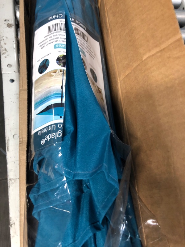 Photo 3 of ***MAJOR DAMAGE - RIB BROKEN - WON'T RETRACT***
Sunnyglade 9' Solar 24 LED Lighted Umbrella with 8 Ribs (Teal Blue) | 18"