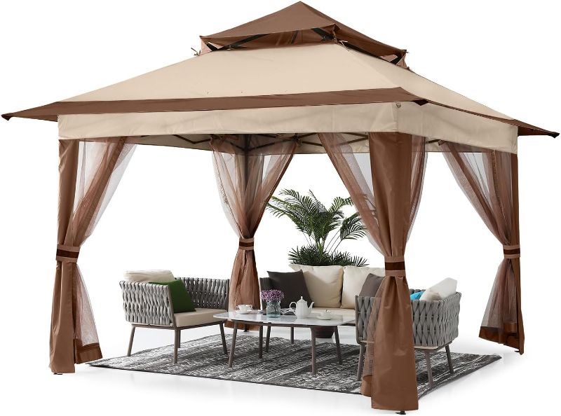 Photo 1 of **STOCK PHOTO FOR REFERENCE MAY NOT BE EXACT ITEM** Beige/Brown Gazebo canopy tent, unknown size