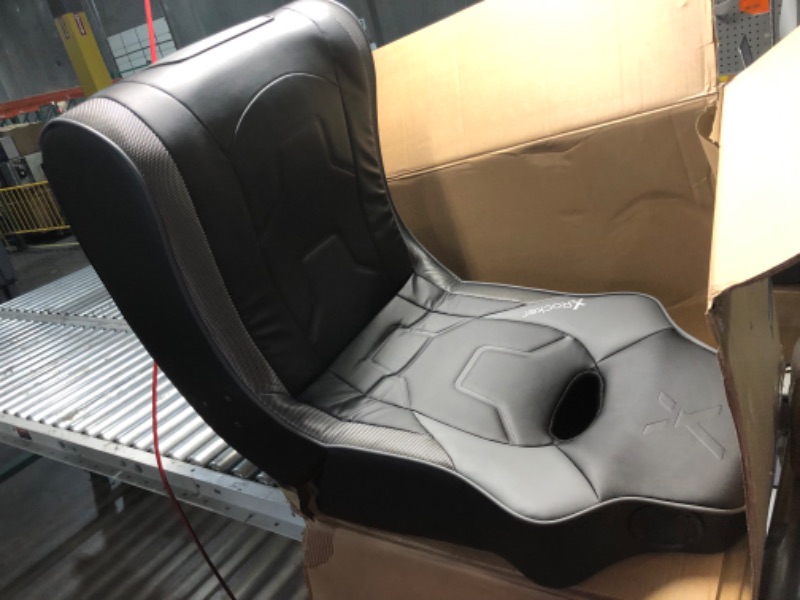 Photo 6 of ***USED - LIKELY MISSING PARTS - UNABLE TO VERIFY FUNCTIONALITY***
X Rocker G-Force RGB LED Video Gaming Floor Chair with Armrests, Built-In Audio via Wireless Bluetooth, Foldable, Vegan Leather, 250 lbs Max, Black