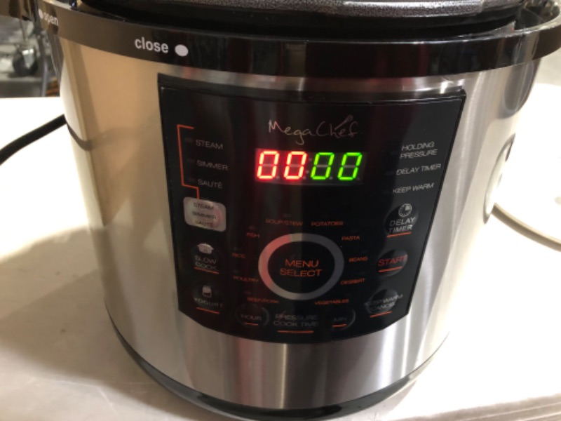 Photo 5 of ***POWERS ON - UNABLE TO TEST FURTHER***
MegaChef 12 Quart Digital Pressure Cooker with 15 Preset Options and Glass Lid, Silver