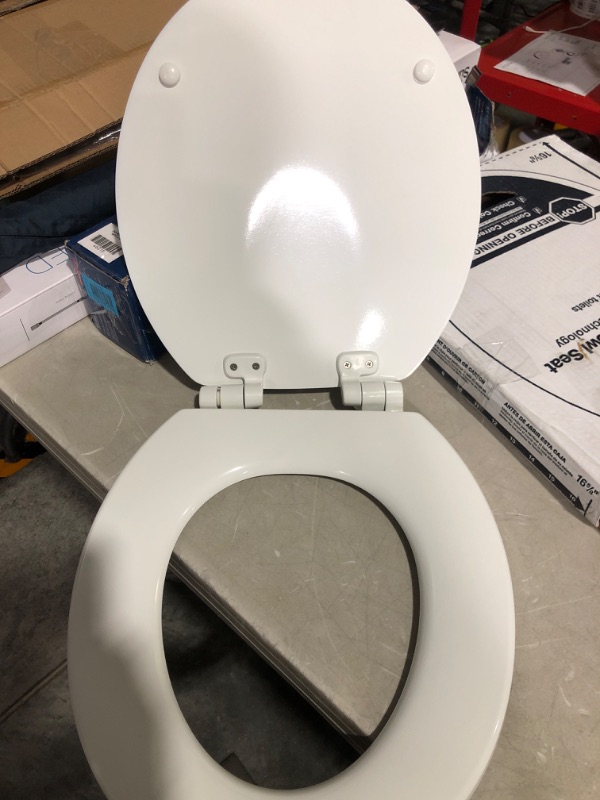 Photo 4 of * used * damaged * see images * 
KOHLER Stonewood® Quiet-Close™ Round-front, Slow-Close, Wood, White toilet seat, 