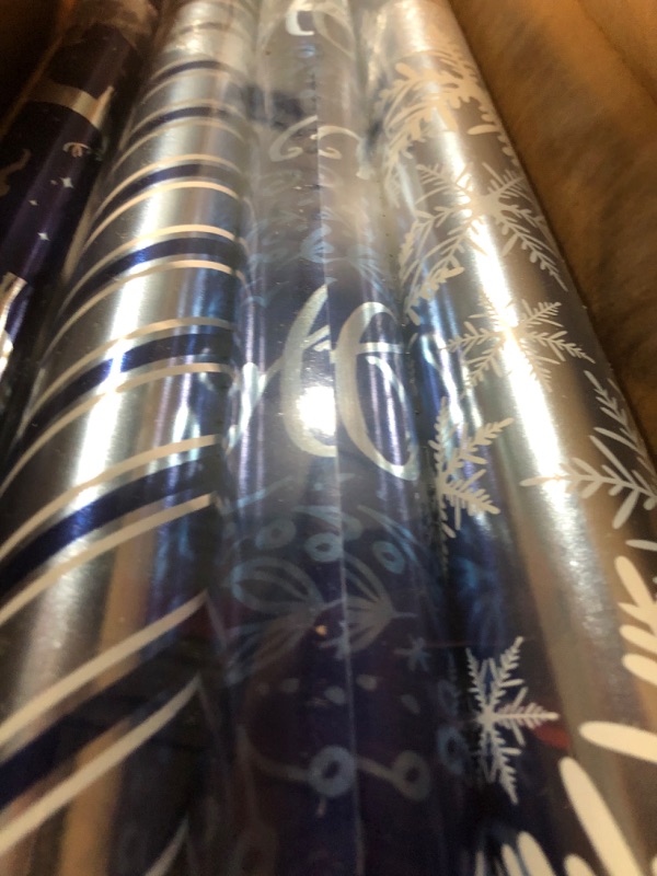 Photo 4 of American Greetings 80 sq. ft. Blue Wrapping Paper Bundle for Christmas, Hanukkah  (4 Rolls 30 in. x 8 ft.) Blue and Silver