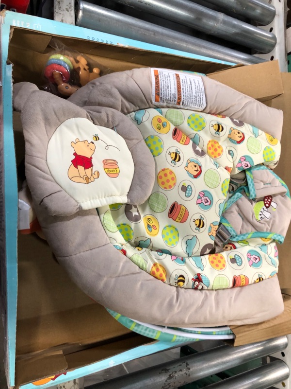 Photo 4 of Bright Starts Winnie the Pooh Dots & Hunny Pots Baby Bouncer with Vibrating Infant Seat, Music & 3 Playtime Toys, 23x19x23 Inch