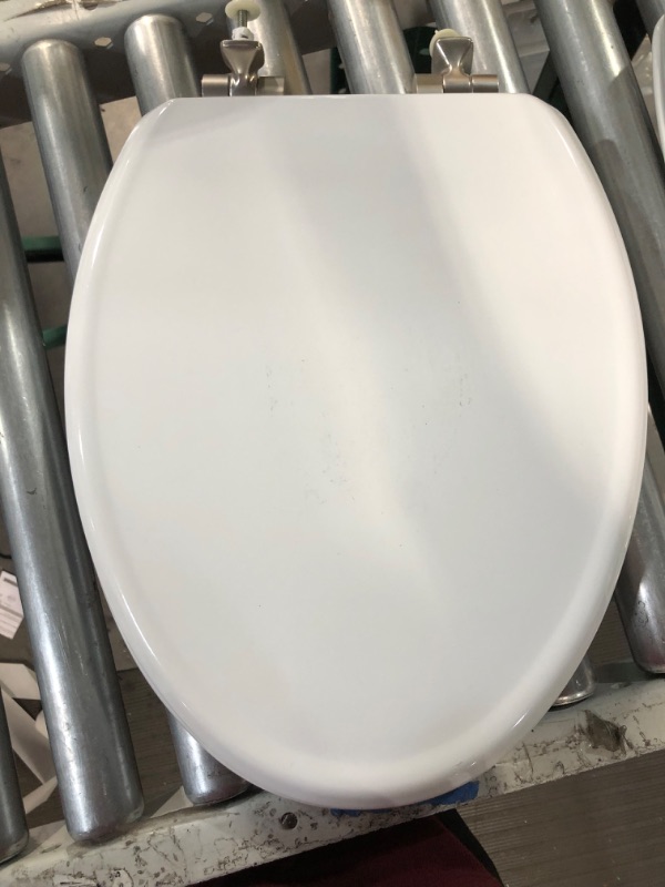 Photo 3 of **NON REFUNDABLE NO RETURNS SOLD AS IS**
**PARTS ONLY**
Mansfield Wood White Elongated Soft Close Toilet Seat
