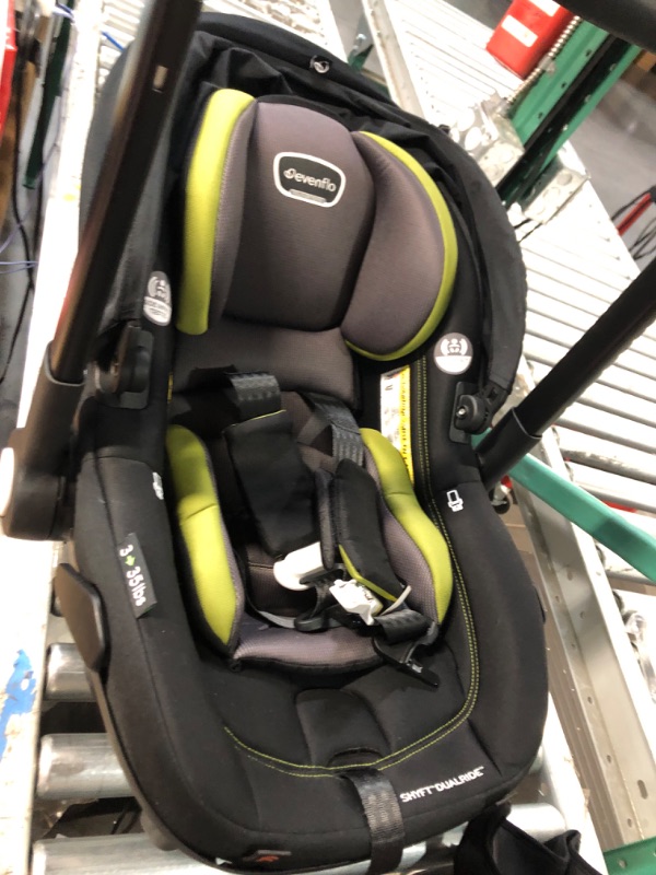 Photo 11 of Evenflo Shyft DualRide Infant Car Seat and Stroller Combo with Carryall Storage (Durham Green) Shyft Dualride Durham Green