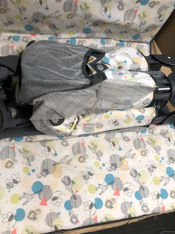 Photo 3 of *PREV USED-MINOR STAINS*
Graco Pack and Play Portable Playard, Push Button Compact Fold, Carnival Portable Playard 