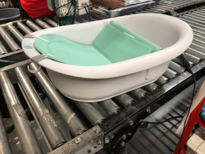 Photo 3 of 4-in-1 Grow-with-Me Bath Tub by Frida Baby Transforms Infant Bathtub to Toddler Bath Seat