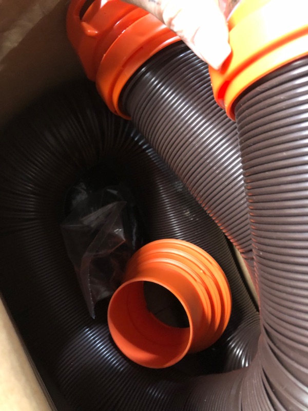 Photo 2 of Camco RhinoFLEX RV Sewer Hose Kit with Swivel Transparent Elbow and 4-in-1 Dump Station Fitting, Brown, 15 Feet (39770) 15ft Sewer Hose Kit Frustration-Free Packaging