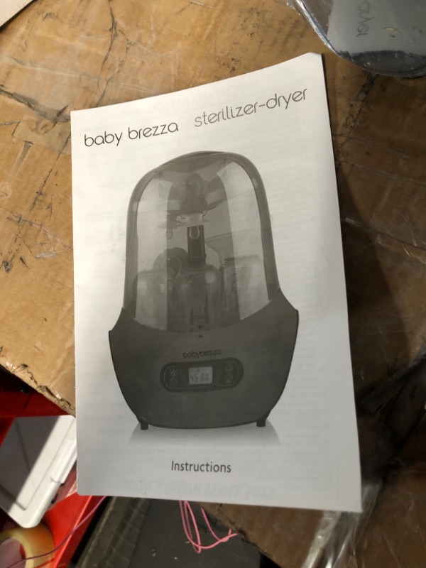 Photo 1 of Baby Brezza Baby Bottle Sterilizer and Dryer Machine – Electric Steam Sterilization - Universal Fit - Pacifiers, Glass, Plastic, and Newborn Feeding Bottles, Charcoal