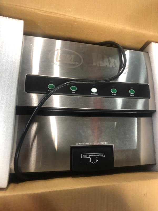 Photo 1 of * used * powers on * see all images *
Stainless Steel Vacuum Sealer with Bag Cutter and Holder