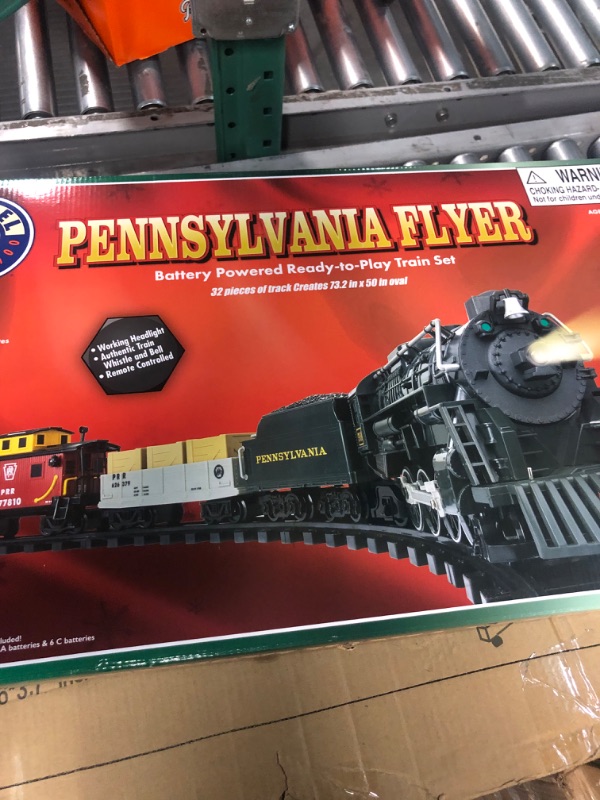 Photo 4 of **MISSING REMOTE AND 23/32 TRACK RAILS**
Lionel Pennsylvania Flyer battery-powered Train Set with Remote + Inner Loop Track Expansion 