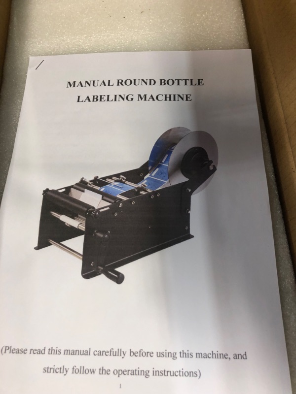 Photo 4 of ZONEPACK Manual Round Labeling Machine with Handle Manual Round Bottle Labeler Label 