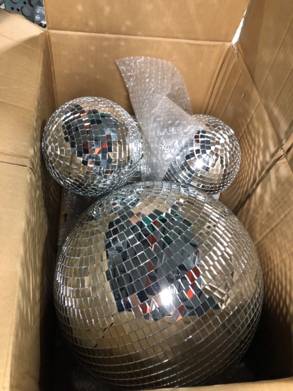 Photo 1 of 4 pack Large Disco Ball Silver Hanging Disco Balls Reflective Mirror Ball Ornament for Party Holiday Wedding Dance and Music Festivals Decor Club Stage Props (12 Inch, 8 Inch, 6 Inch, 4 Inch)
