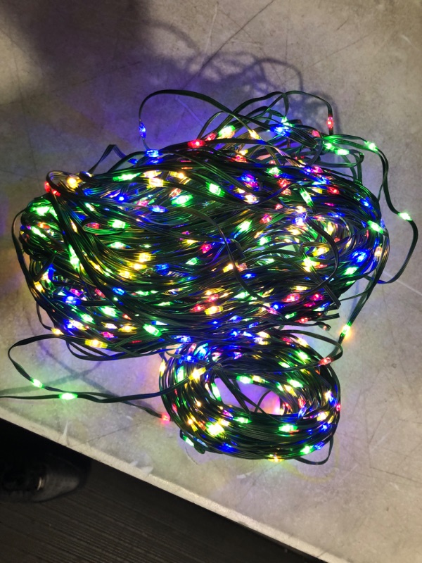 Photo 2 of TOUBIK 1000 LED Christmas Lights Outdoor Indoor,110Ft 8 Modes Warm White End-to-End Connectable Fairy String Light Plug in for Xmas Tree Party Wedding Outside Decorations Multicolor 1000LED