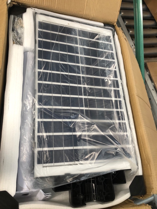 Photo 3 of **USED BUT APPEARS NEW**  wudor 2 Pack 1200W Solar Street Lights Outdoor , 1,152 LED Ultra Bright Waterproof Street Light, 120,000LM White Light Dusk to Dawn, with Motion Sensor and Remote Control, for Parking Lots, etc.