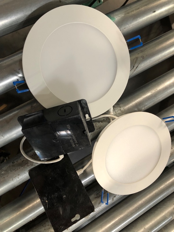 Photo 1 of **USED BUT APPEARS NEW**  Sunco Lighting 6 Inch Ultra Thin LED Recessed Ceiling Lights, Smooth Trim, 5000K Daylight, Dimmable, 14W=100W, 850 LM, Wafer Thin, Canless with Junction Box - Energy Star 2 Pack 5000k Daylight 2 Count (Pack of 1)