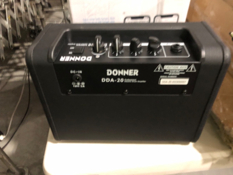 Photo 7 of **NON REFUNDABLE NO RETURNS SOLD AS IS***************
**PARTS ONLY** **
**PARTS** **SEE CLERK NOTES** Donner Mini Electric Drum Amp 20W Wireless Electronic