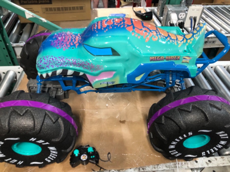 Photo 2 of Hot Wheels RC Monster Trucks 1:6 Scale Mega-Wrex, Large Remote-Control Toy Truck, All-Terrain Tires, 2ft+ Long