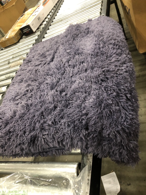 Photo 2 of 50" X 36" FLUFFY LIGHT PURPLE AREA RUG