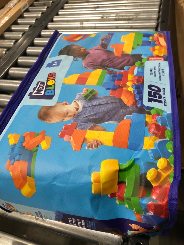 Photo 1 of Mega Bloks Deluxe Building Bag Blue + Build ‘n Learn Table, Building Set Bundle, 165 Pieces, Building Toys for Toddlers
