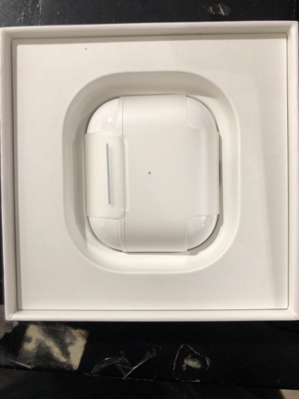 Photo 2 of Apple AirPods with Lightning Charging Case, 3rd Gen
