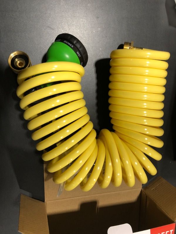 Photo 2 of Yereen Coil Garden Hose 25FT, EVA Recoil Garden Hose, Self-coiling Water Hose with 3/4" Brass Connector Fittings with 8 Function Spray Nozzle, Creamy Yellow 25FT Creamy Yellow