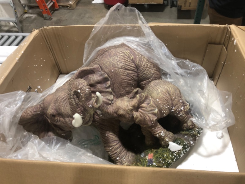 Photo 1 of Design Toscano Elephant's Majesty Glass-Topped Cocktail Table