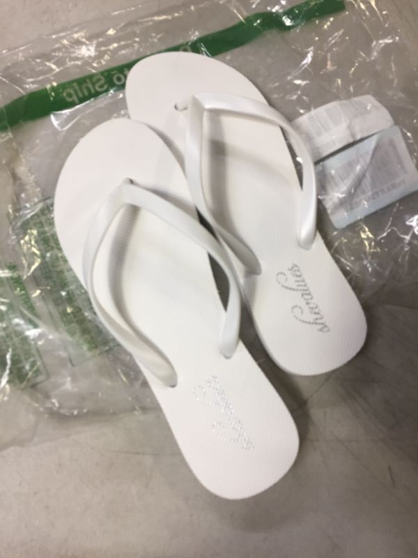 Photo 1 of FLIP FLOPS WHITE SIZE 8