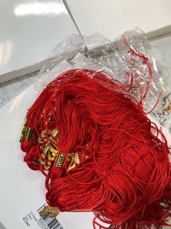 Photo 1 of 10 Pieces 2023 Grad Graduation Tassels Graduation Cap Tassels Graduation Hat Decoration Tassel with 2023 Year Gold Date Charms for 2023 Graduation Party Activities (Red) 5 PACK 