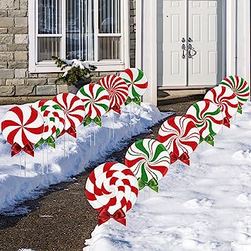 Photo 1 of 12 Pcs Christmas Outdoor Yard Signs Peppermint Corrugated Yard Decorations with Stakes and Bow Xmas Yard Decor Candy Garden Sign Waterproof Cardboard Lawn Signs for Pathway Walkway Decor (Candy Style)