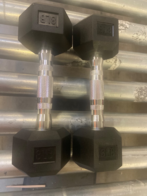 Photo 1 of 2 count of 8lb dumbbells'
