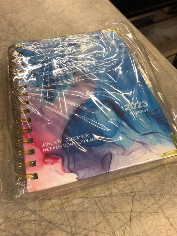 Photo 1 of 2023 Planner, Jan.- Dec. 2023, Weekly/ Monthly Planner with Tabs, Front Pocket, 6.5" x 8.5" x .75", Medium Size, Hardcover Front + Back, Thick Pages + Twin Wire Binding, Daily Organizer
pack of 2