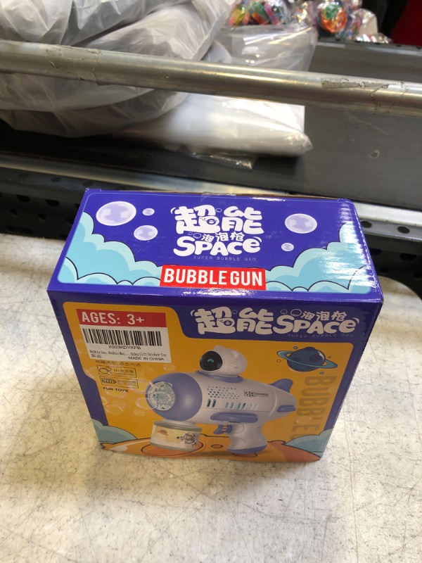 Photo 2 of Bubble Gun, Bubble Machine Space Journey, Bubble Blower 360° Leak-Proof Design, Bubble Blaster 12 Holes Rich Bubbles, Automatic Bubble Guns for Kids Toddlers, Party Favors Birthday Gift