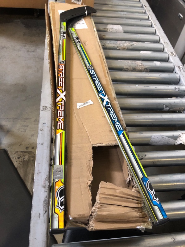 Photo 2 of Franklin Sports NHL Kids Street Hockey Stick Set - Includes (2) Youth Street Hockey Sticks + (1) Outdoor Roller Hockey Ball - Perfect Hockey Starter Set for Kids Player Sticks