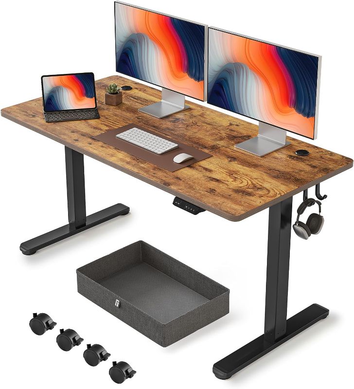 Photo 1 of FEZIBO 55 x 24 Inches Standing Desk with Drawer, Adjustable Height Electric Stand up Desk, Sit Stand Home Office Desk, Ergonomic Workstation Black Steel Frame/Rustic Brown Tabletop