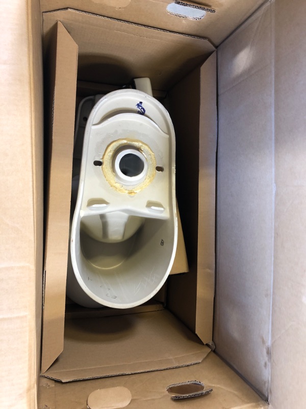 Photo 2 of 2-piece 1.1 GPF/1.6 GPF High Efficiency Dual Flush Complete Elongated Toilet in White, Seat Included HAS SOME CRACKS ON THE SIDE OF TOP TANK PART  