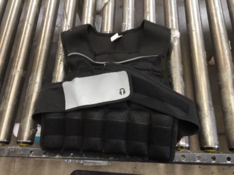 Photo 2 of 20lb weighted vest - missing two accessories 