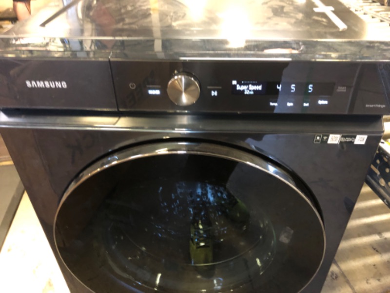 Photo 3 of Bespoke 5.3 cu. ft. Ultra Capacity Front Load Washer with AI OptiWash™ and Auto Dispense in Brushed Navy
