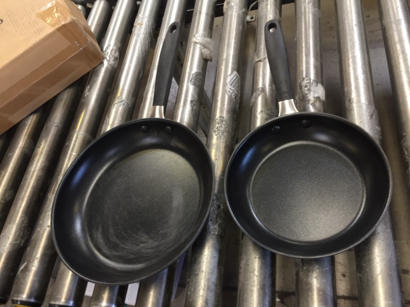 Photo 1 of 8&10 inch pans 