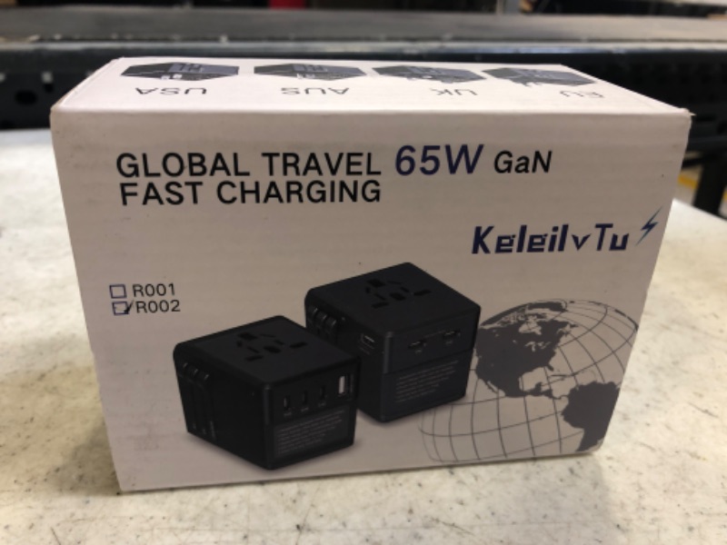 Photo 2 of Global Travel Adapter 65W Fast Charger with 3 Type-c and 1 USB Universal Travel Plug adapters with 1M Lightning Cable for Over 200 Countries Including UK Japan China EU (Black) 2C+1U-65W-Grey-Lightning Thread