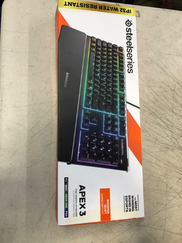 Photo 2 of SteelSeries Apex 3 RGB Gaming Keyboard – 10-Zone RGB Illumination – IP32 Water Resistant – Premium Magnetic Wrist Rest (Whisper Quiet Gaming Switch)
