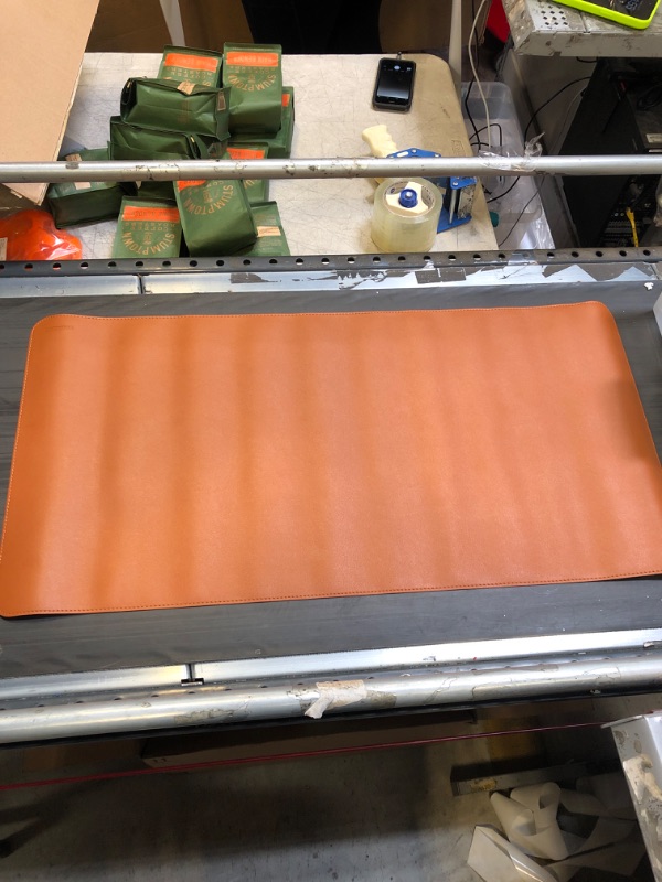 Photo 1 of Tan leather desk mat