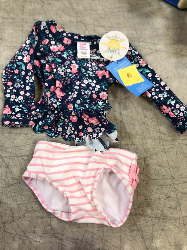 Photo 1 of baby girl floral bathing suit- 2 pc
size- 6-12 months 