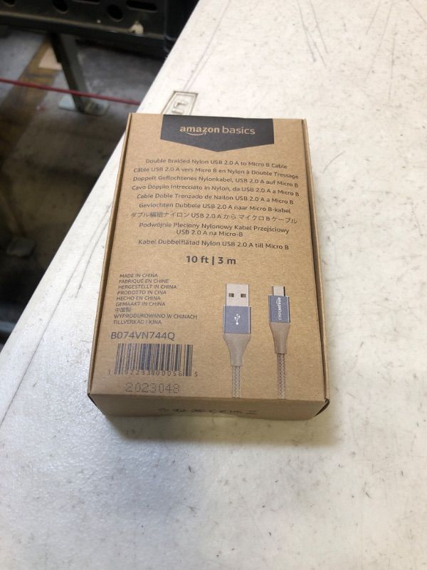 Photo 2 of Amazon Basics Micro USB to USB-A 2.0 Cable, Nylon Braided Cord, 480Mbps Transfer Speed, Gold-Plated, 10 Foot, Dark Gray Dark Grey 10 Feet