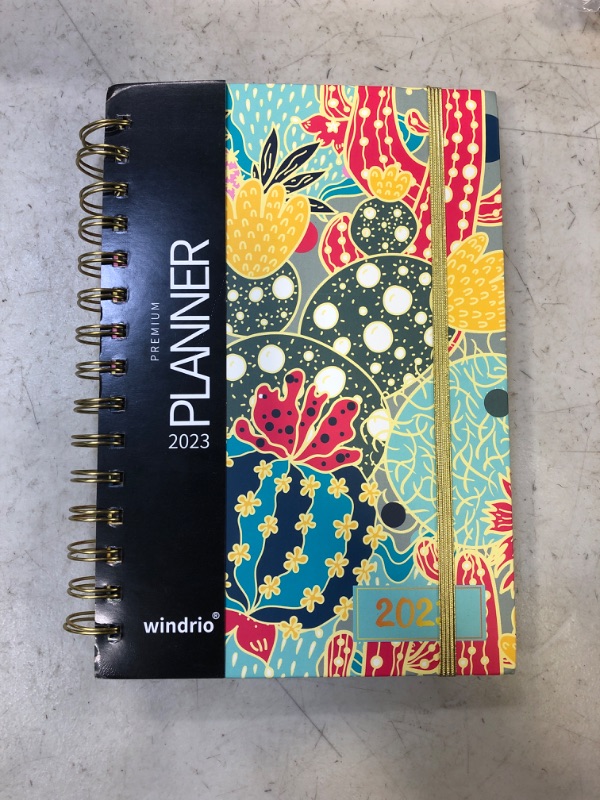 Photo 2 of Planner 2023 Daily Weekly and Monthly, Hardcover 12-Month School Calendar Planner Organizer to DEC.2023, 5.5"x8", Spiral Notebook with Stickers, Inner Pocket, Coated Tabs
