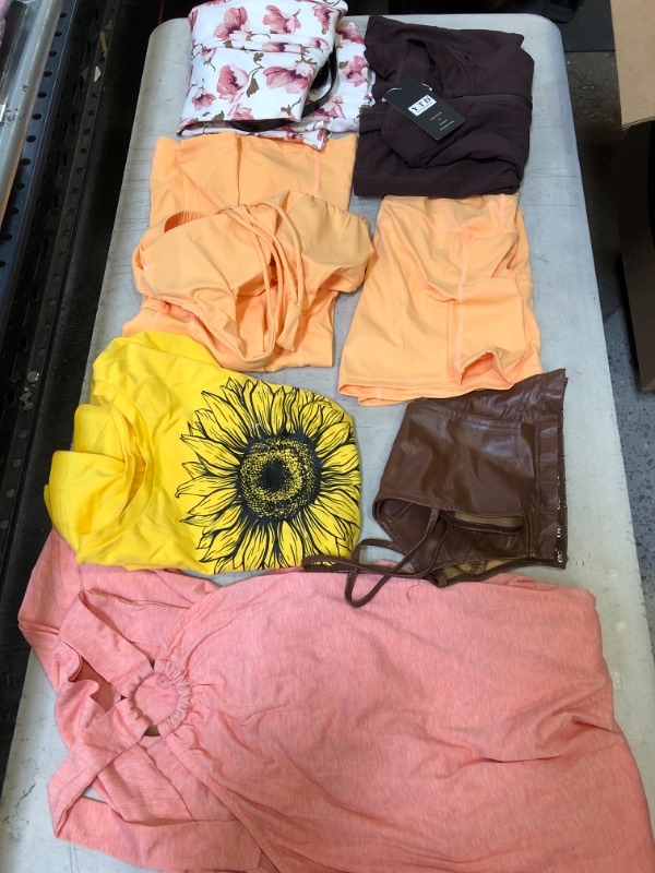 Photo 1 of MISCELLANEOUS BAG LOT - VARIOUS WOMENS CLOTHES - NEW AND USED - SOLD AS IS