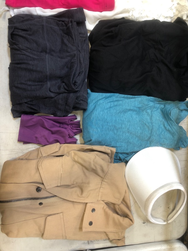 Photo 1 of MISCELLANEOUS BAG LOT - VARIOUS WOMENS CLOTHES - NEW AND USED CLOTHING - SOLD AS IS